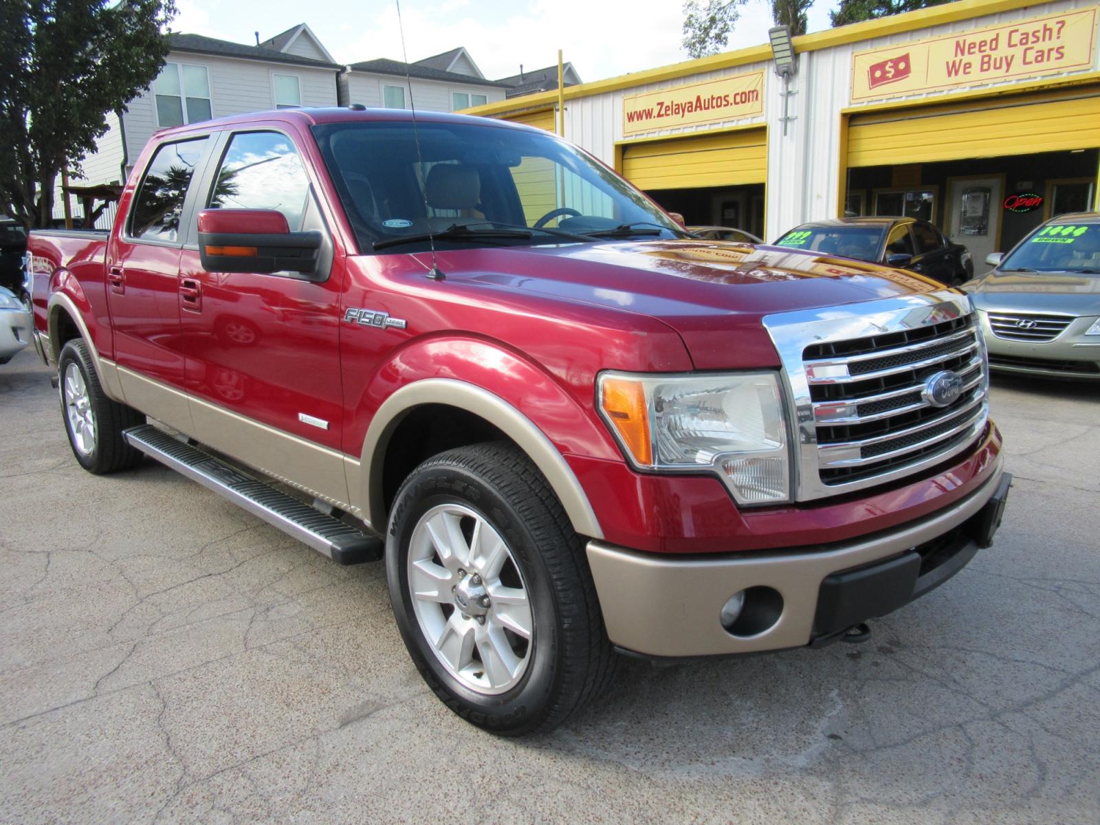 2013 Red /Tan Ford F-150 Lariat (1FTFW1ET3DK) with an 3.5 engine, Automatic transmission, located at 1511 North Shepherd Dr., Houston, TX, 77008, (281) 657-1221, 29.798361, -95.412560 - 2013 FORD F-150 LARIAT VIN: 1FTFW1ET3DKD79524 1 F T F W 1 E T 3 D K D 7 9 5 2 4 CREW PICKUP 3.5L V6 F DOHC 24V GASOLINE REAR WHEEL DRIVE W/ 4X4 - Photo #32